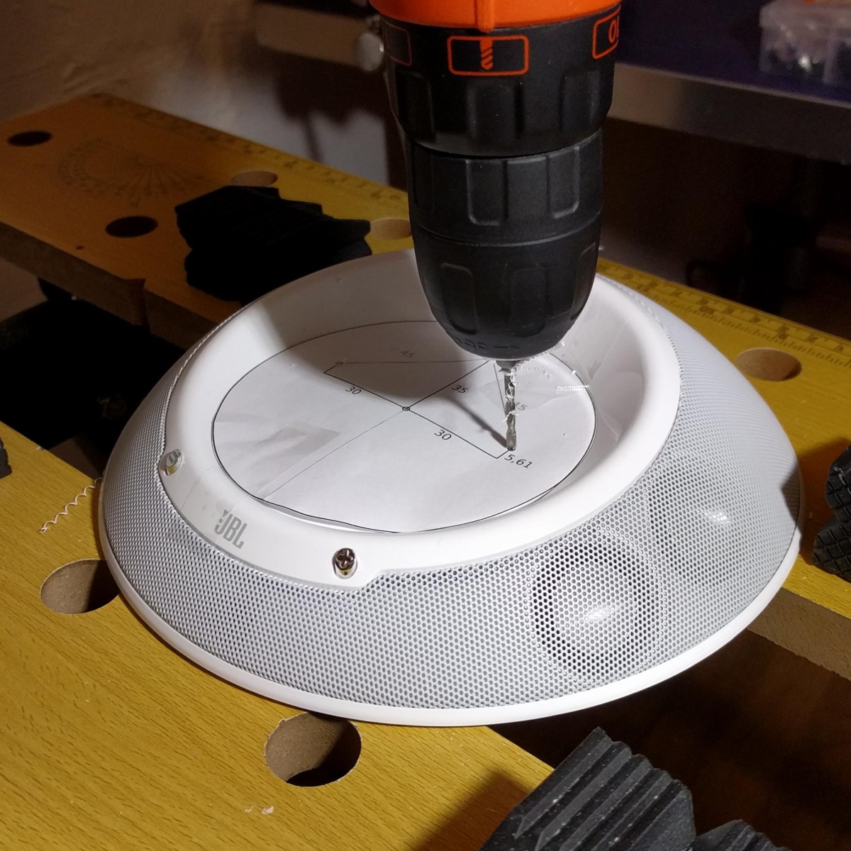 Drilling the holes using the template