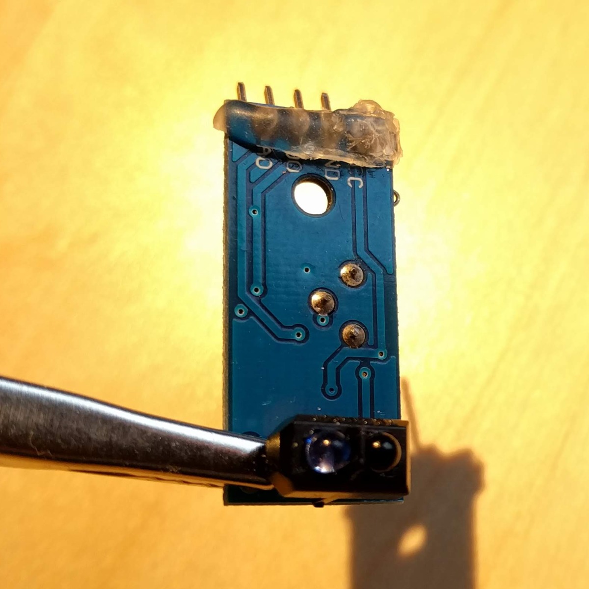 Some hot glue on the back of the pins prevents the brass insert from shortening them