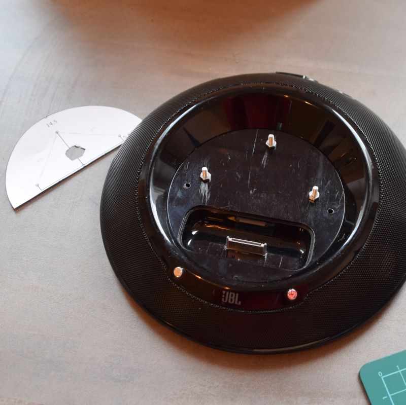 The closed speaker case with the screws that hold the 3D printed case. (This photo was taken before adding the IR LED.)