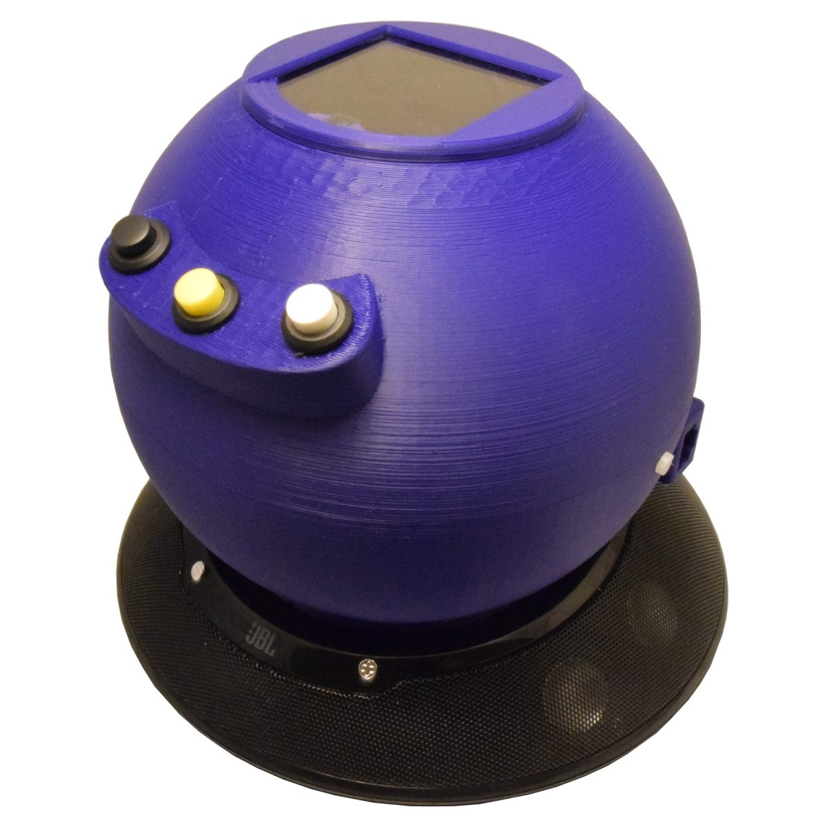 The AudioSphere player. The QR cards are placed on the window on top, where they are detected by a photo sensor that triggers the recognition process. After the code has been read by the webcam, the respective playlist is loaded via network and played directly.
