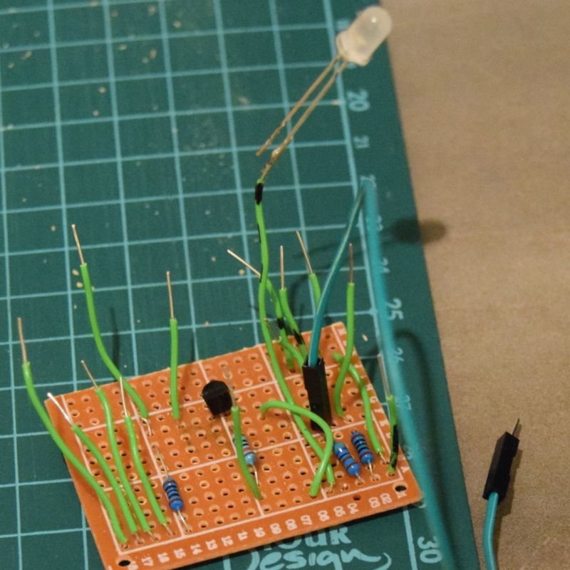 The circuit board after soldering with all resistors and the LED for illumination. Buttons, optical sensor and infrared LED are installed directly in the case.